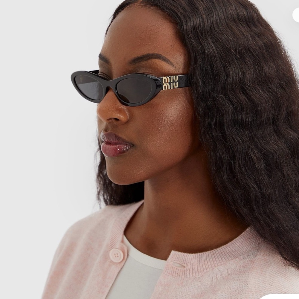 Miu Miu Sleek Black Oval Sunglasses